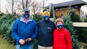 Woody Brown, Kerry Tull, and Sandy Bowieat Yarmouth Lions Club Trees for Tuition